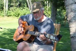 A happy Paul Mills rehearses under a tree just outside Charlottetown 